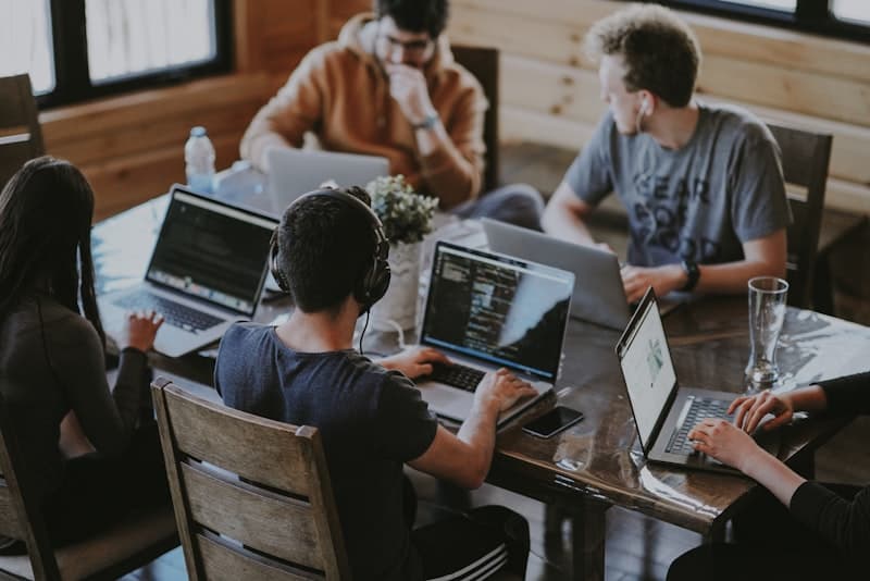 Team organising business documents together